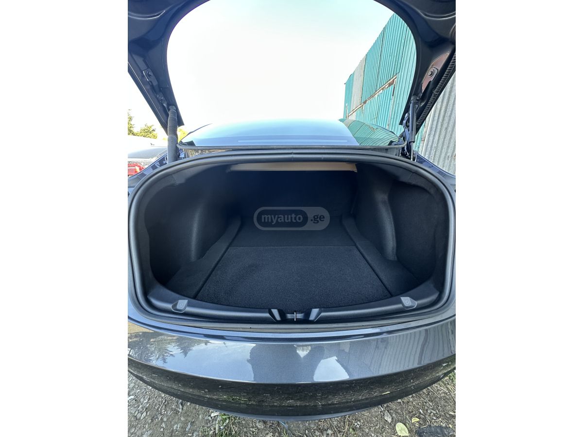 Tesla Model 3 - фото 12