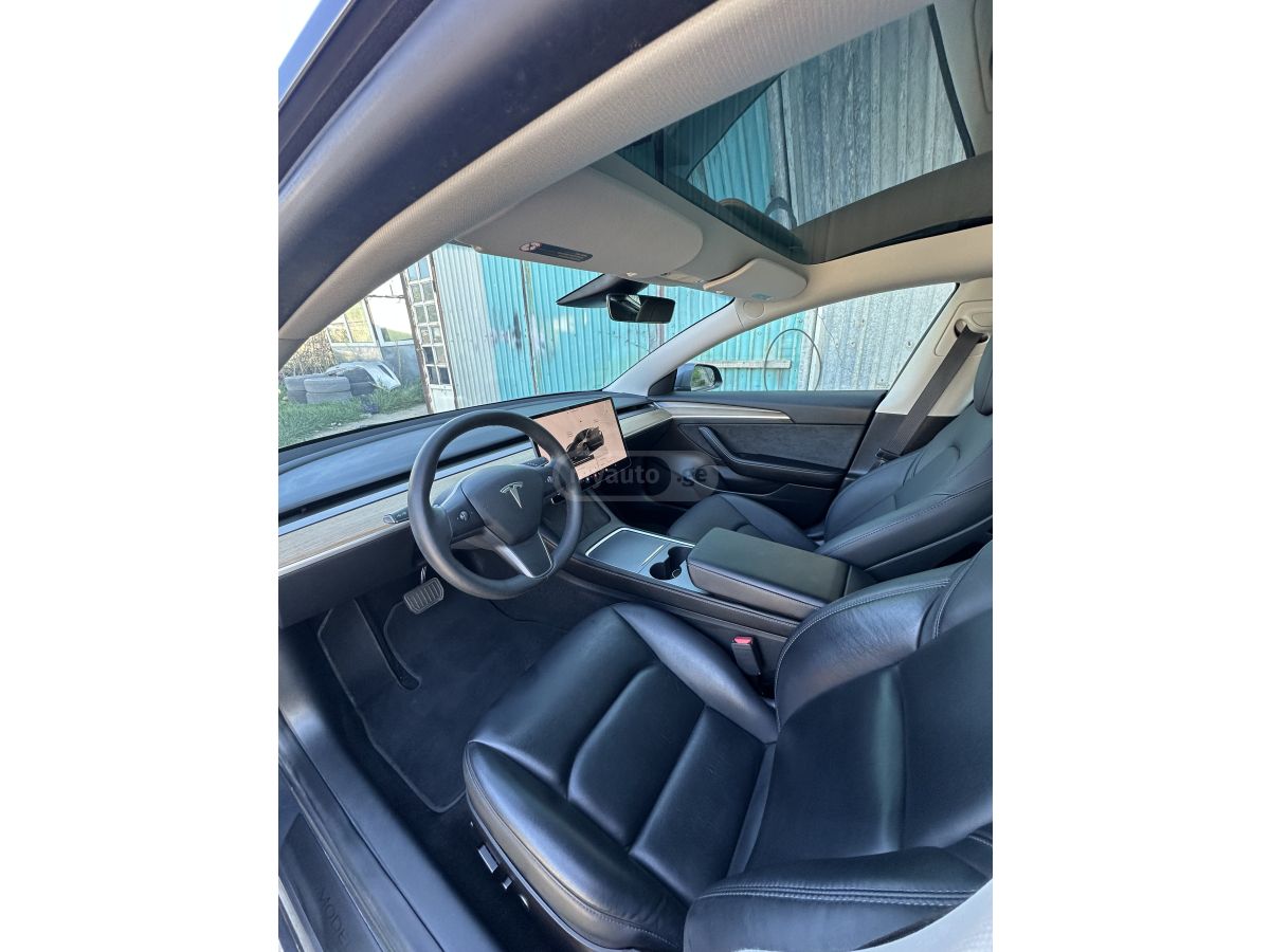 Tesla Model 3 - фото 6