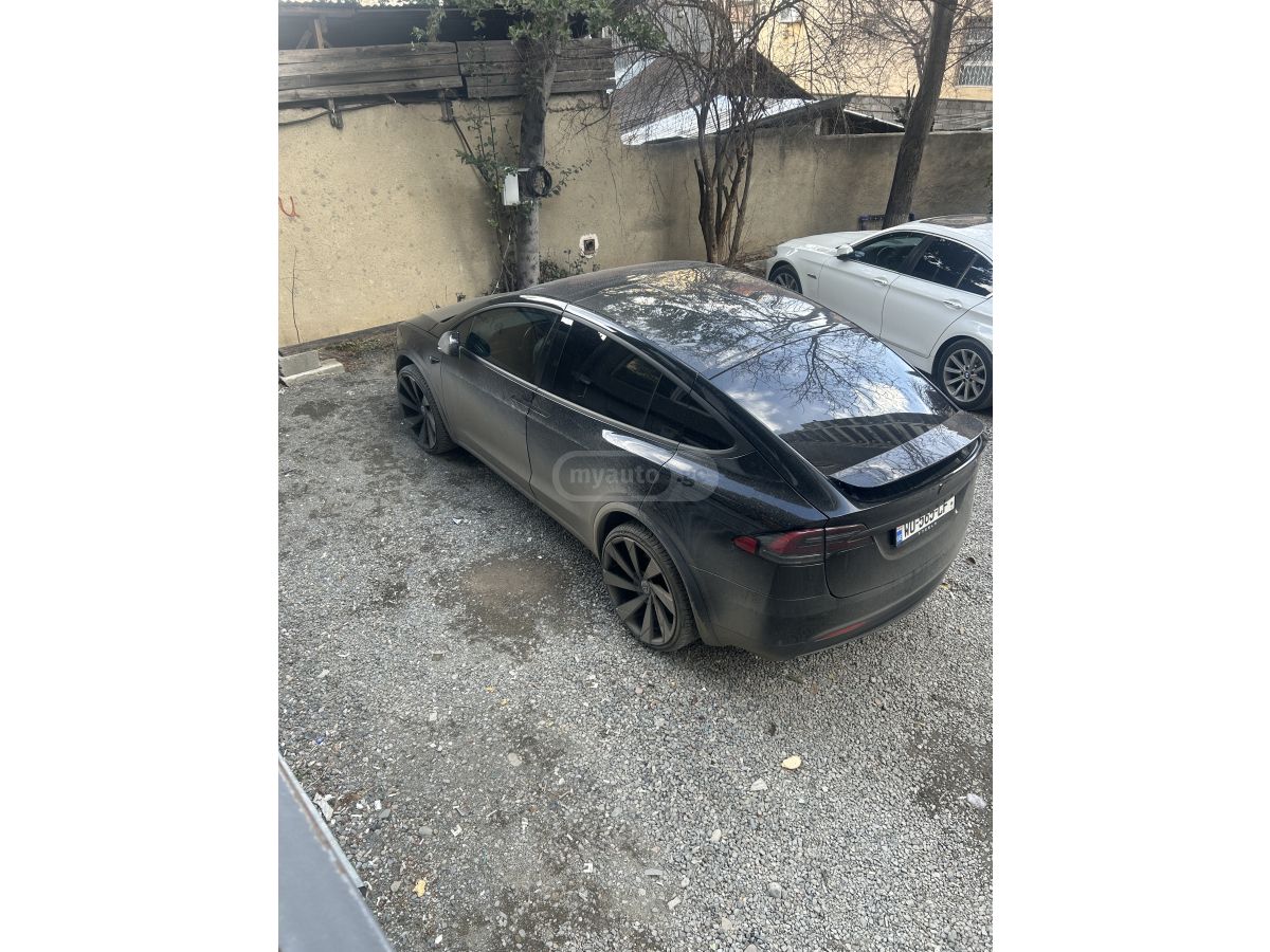 Tesla Model X - фото 11