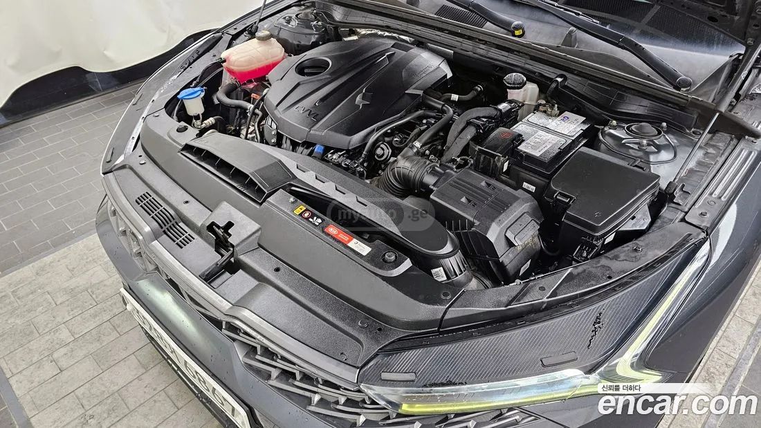 Kia Optima - фото 6