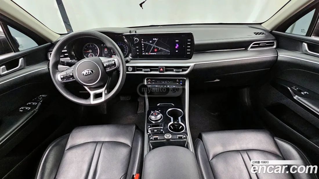 Kia Optima - фото 7