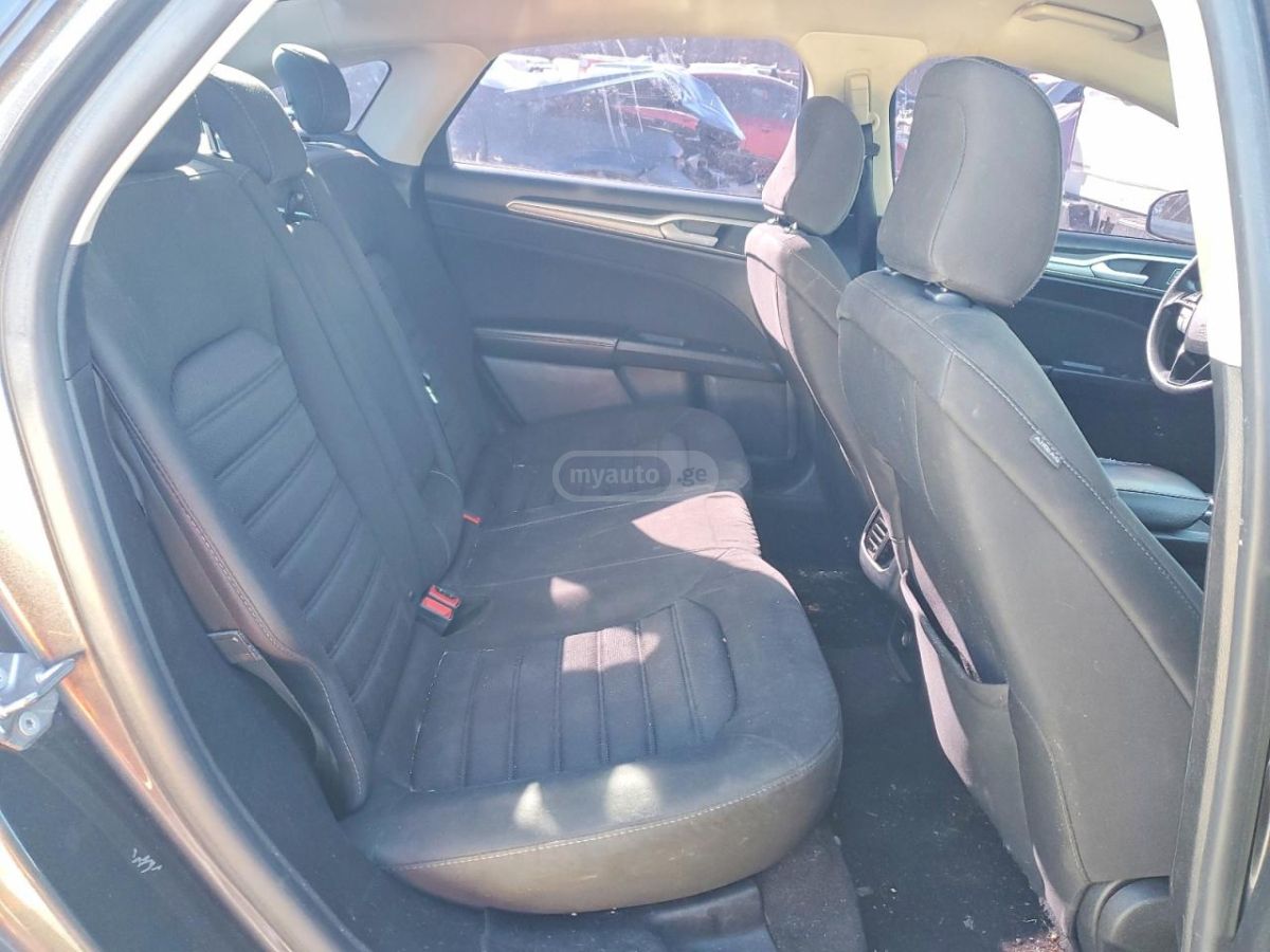 Ford Fusion - фото 10