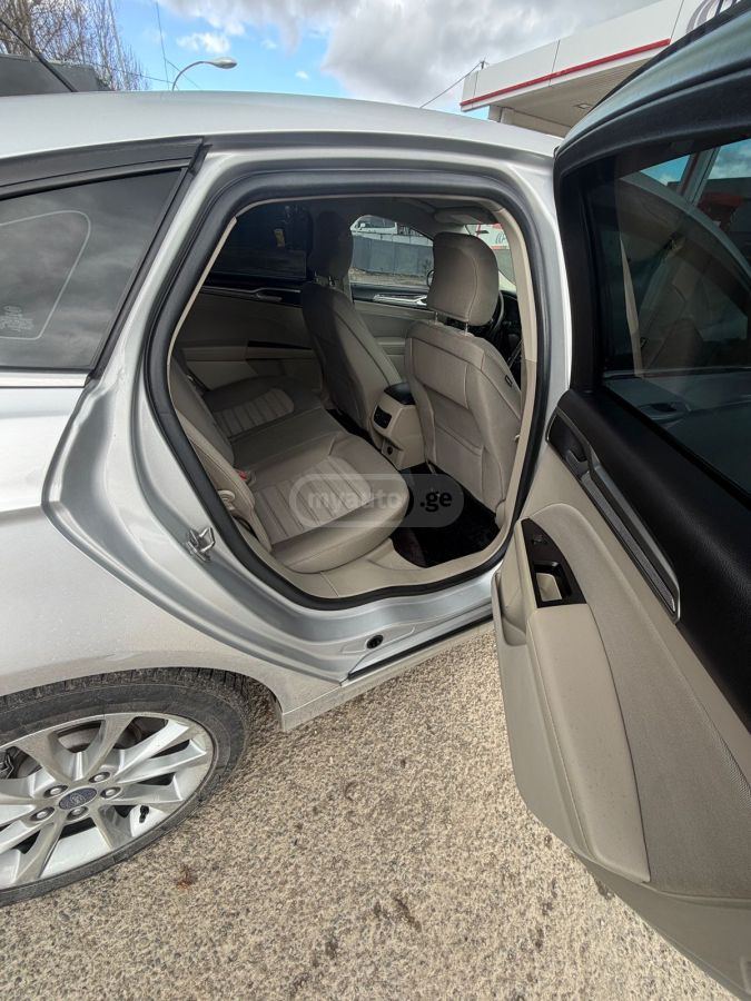 Ford Fusion - фото 11