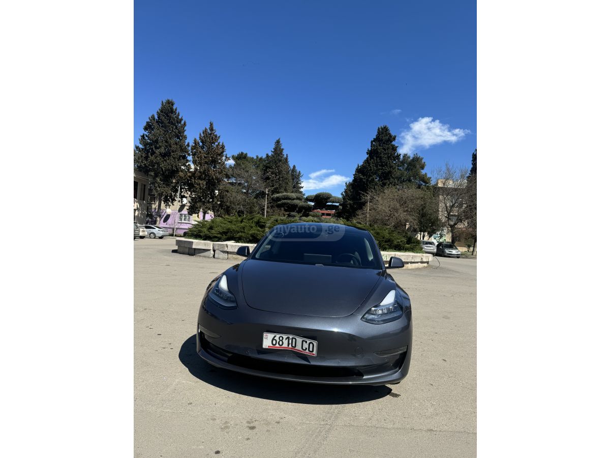 Tesla Model 3 - фото 14