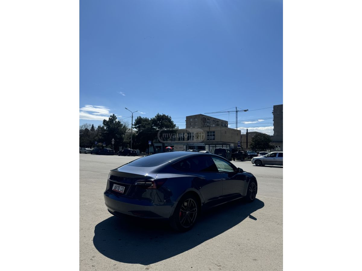 Tesla Model 3 - фото 7