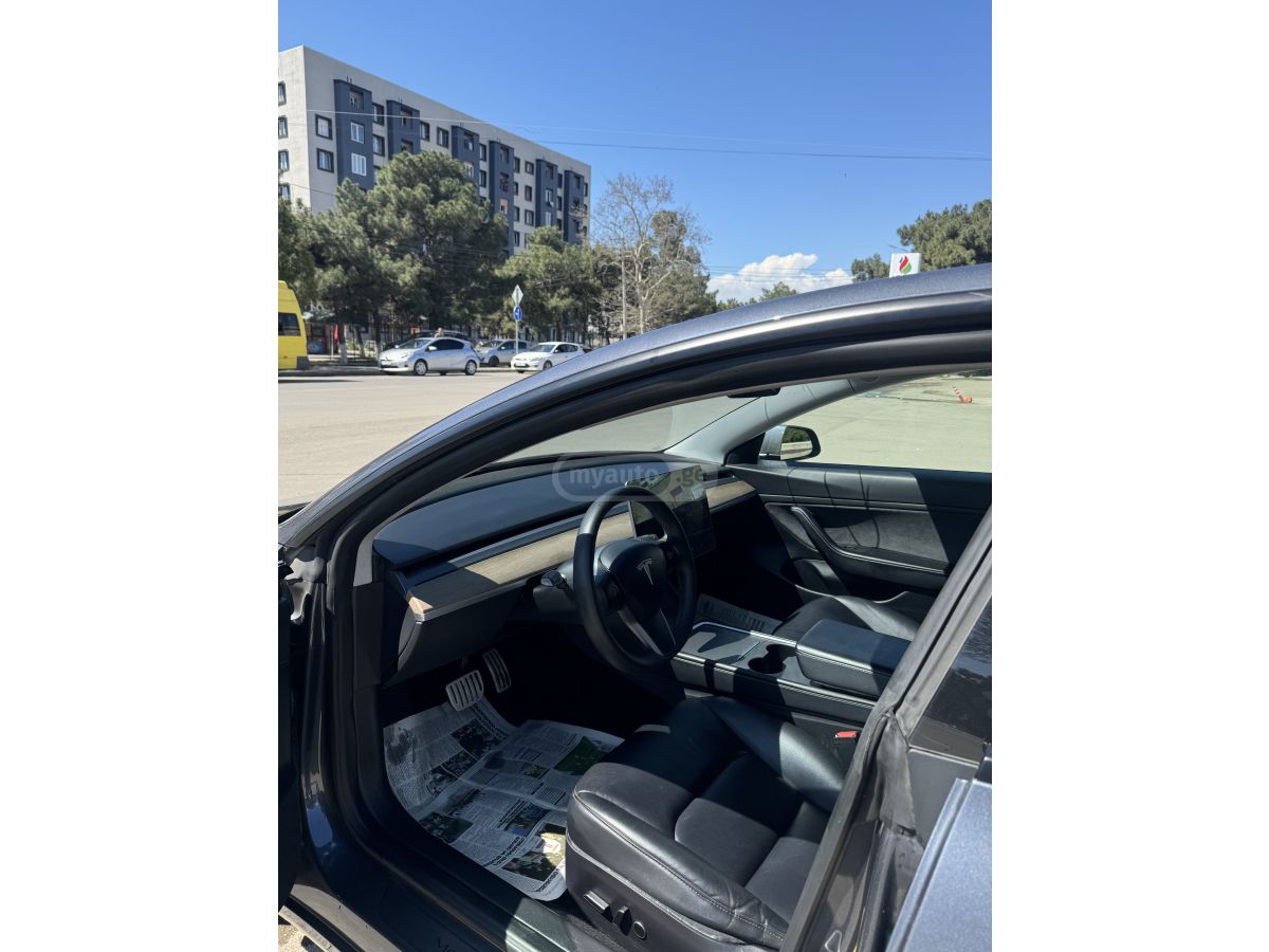 Tesla Model 3 - фото 8