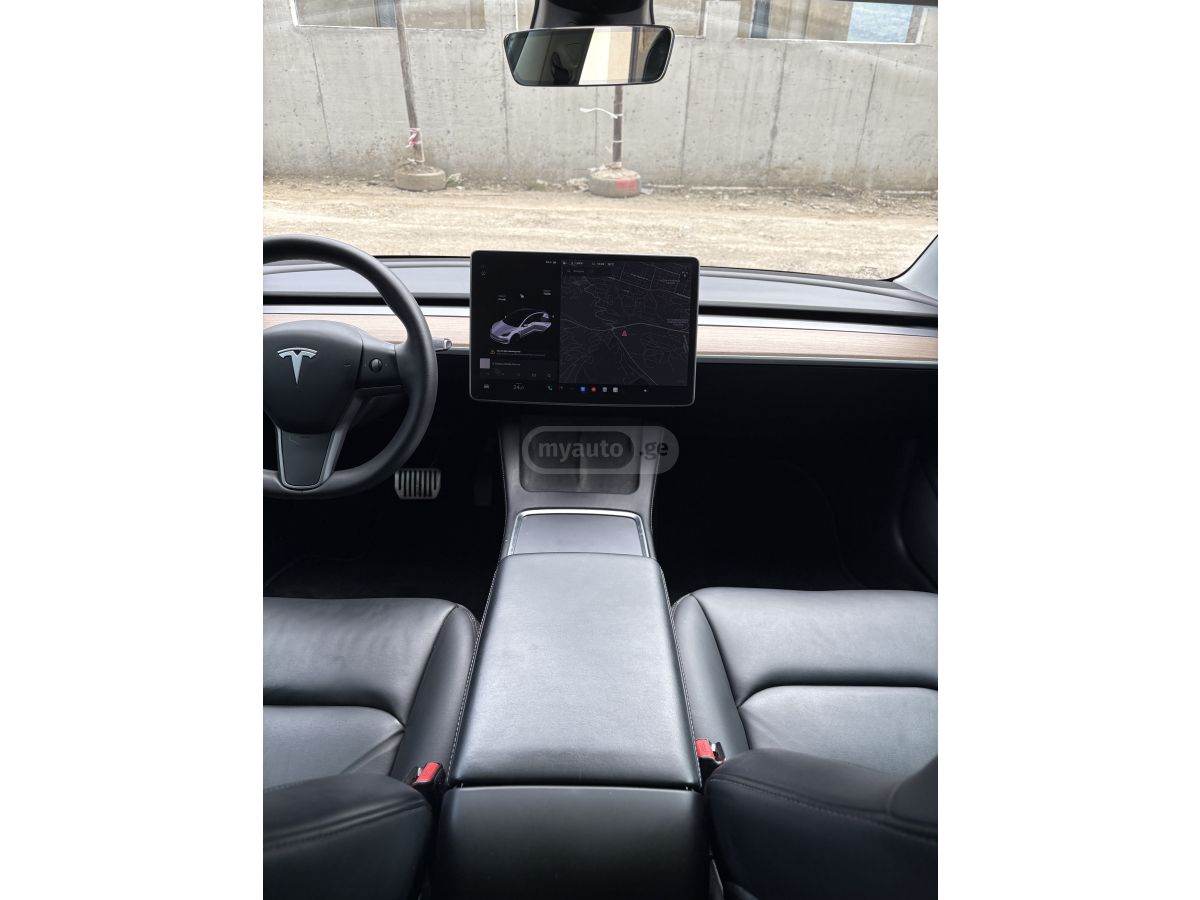 Tesla Model 3 - фото 7