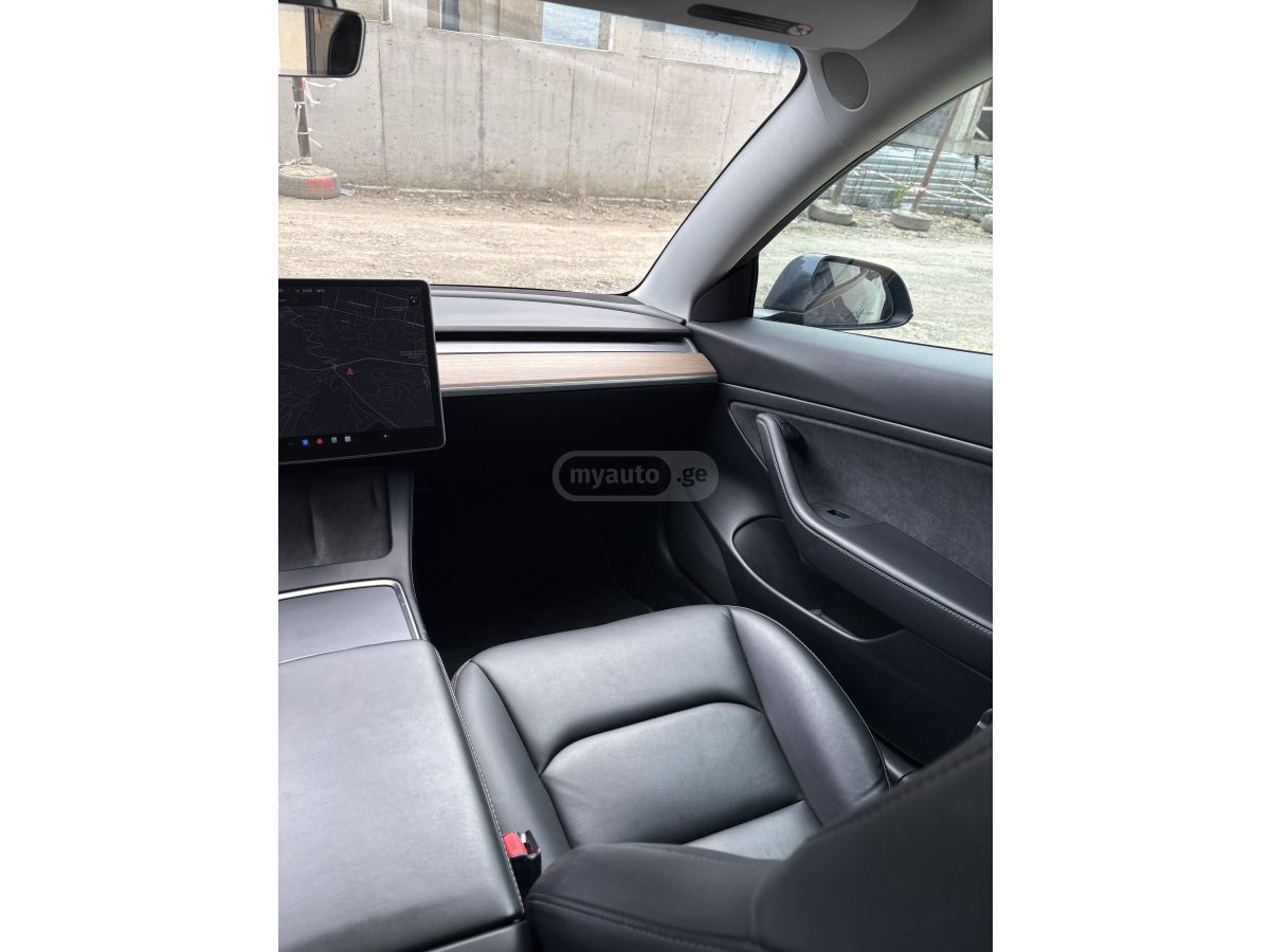 Tesla Model 3 - фото 8