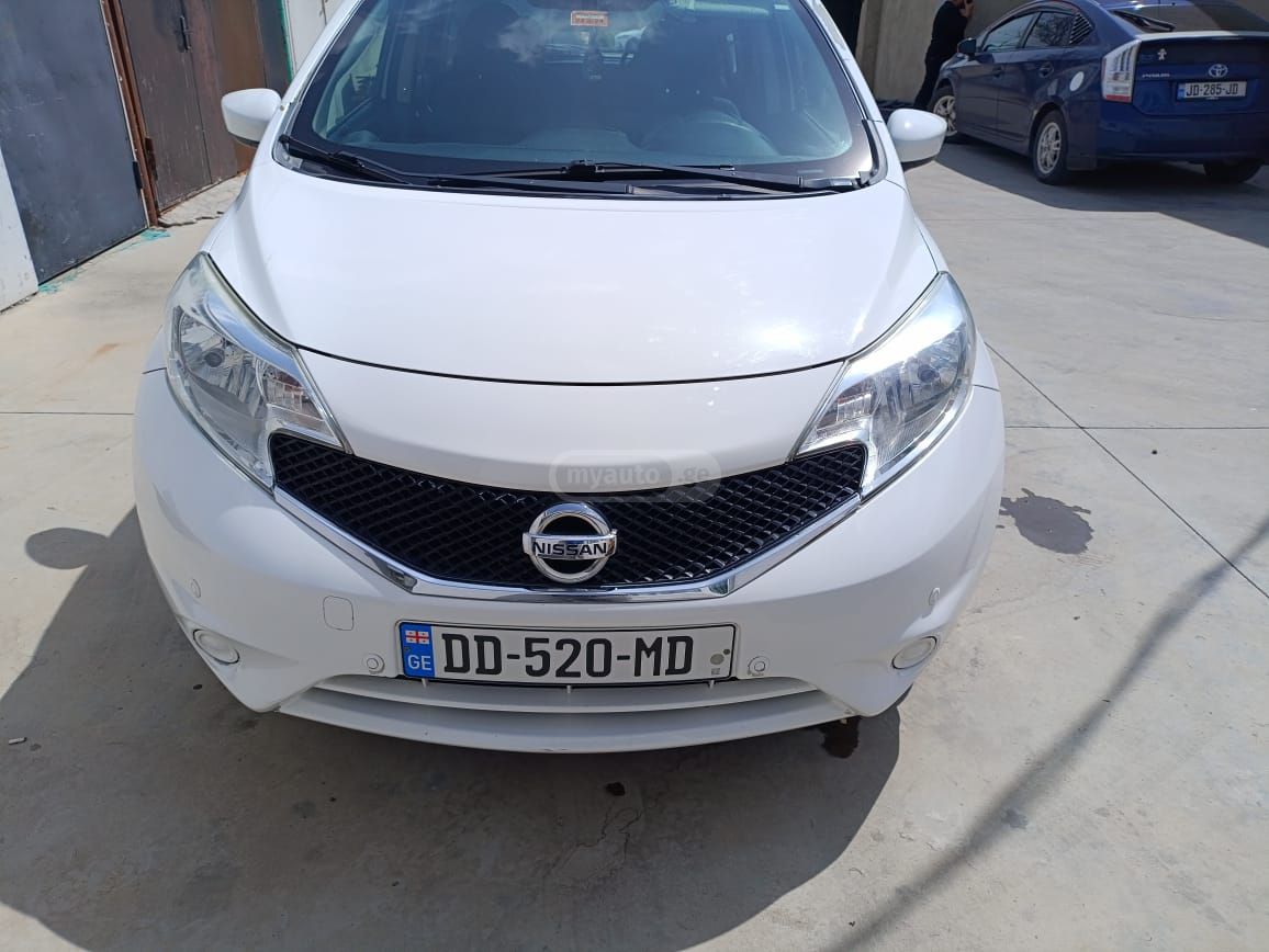 Nissan Versa - фото 12