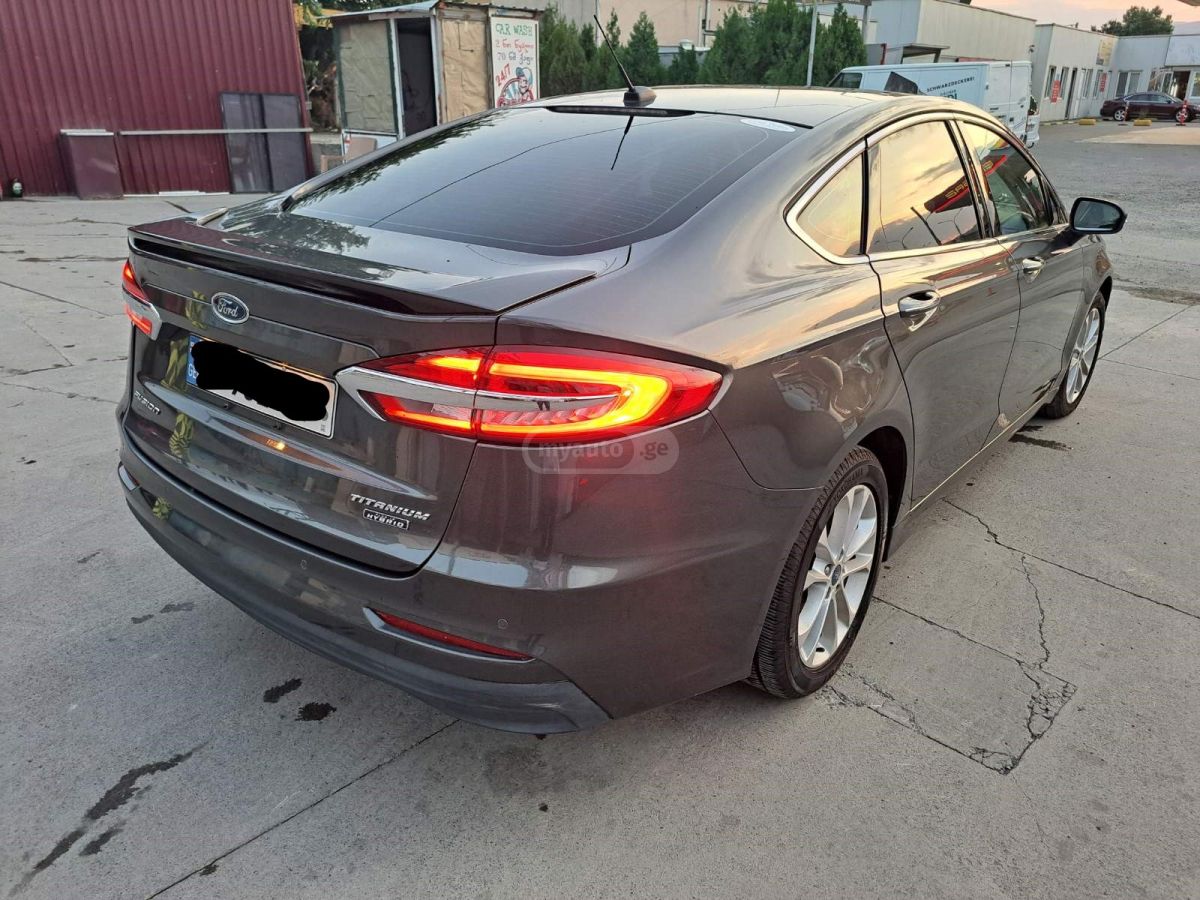 Ford Fusion - фото 11