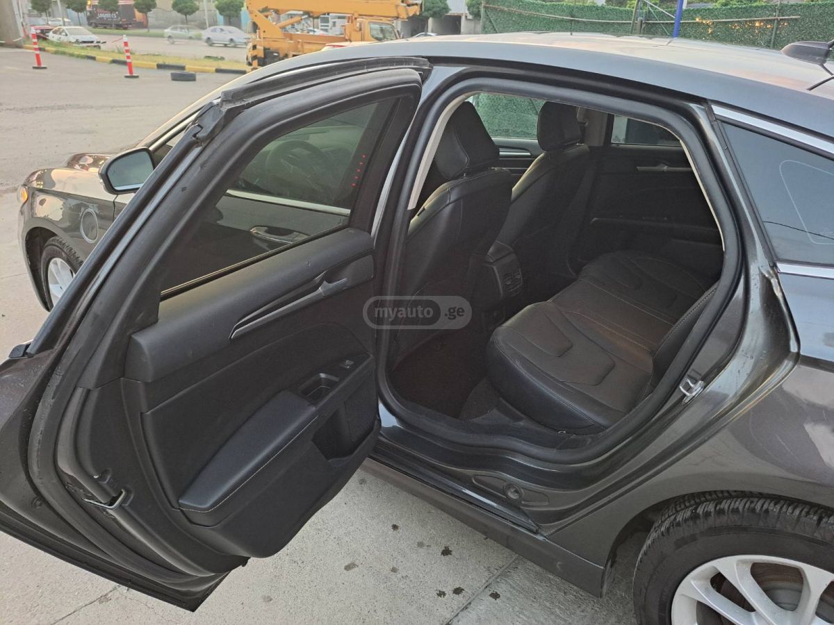 Ford Fusion - фото 13