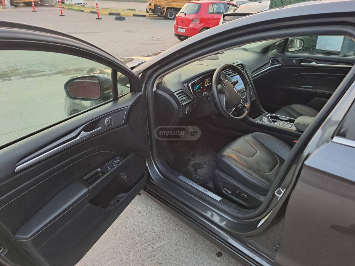 Ford Fusion - фото 9