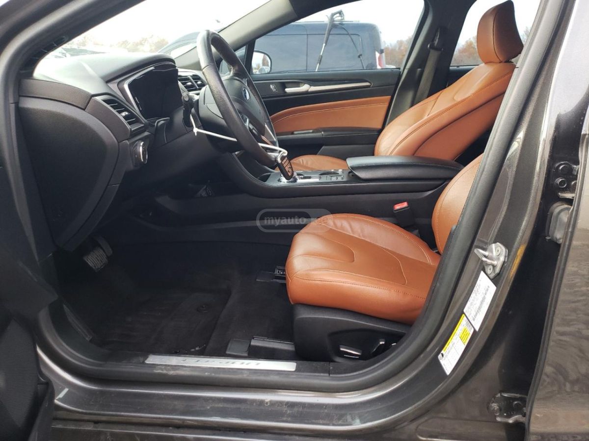 Ford Fusion - фото 7