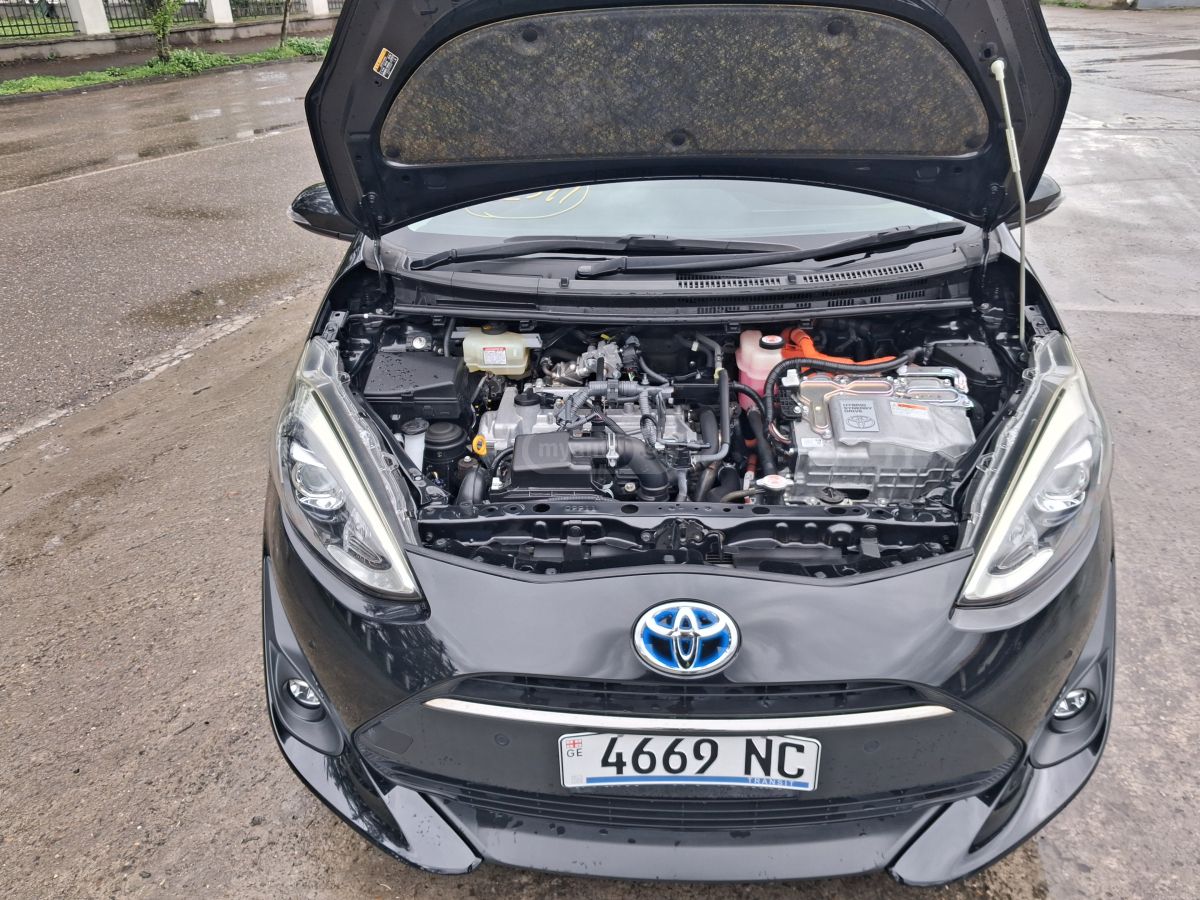 Toyota Aqua - фото 13