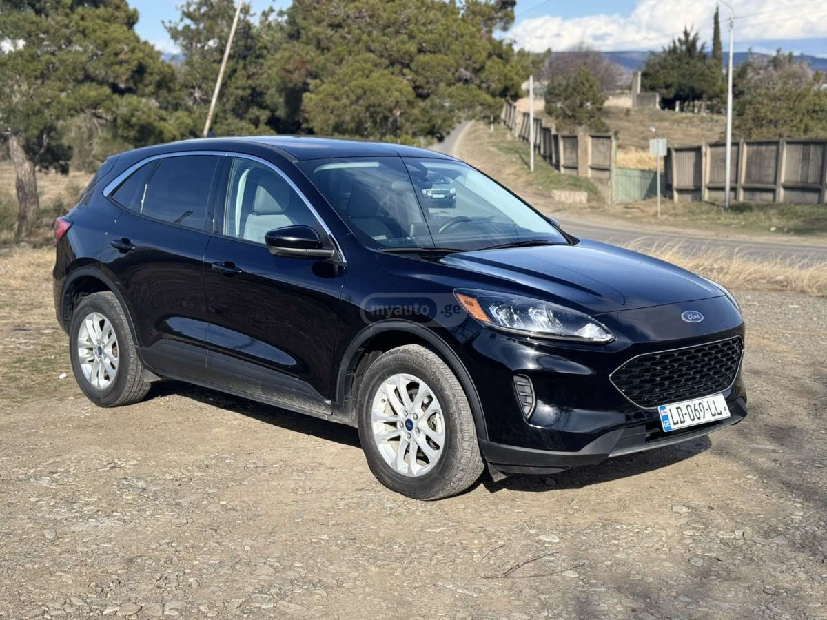 Ford Escape - фото 1