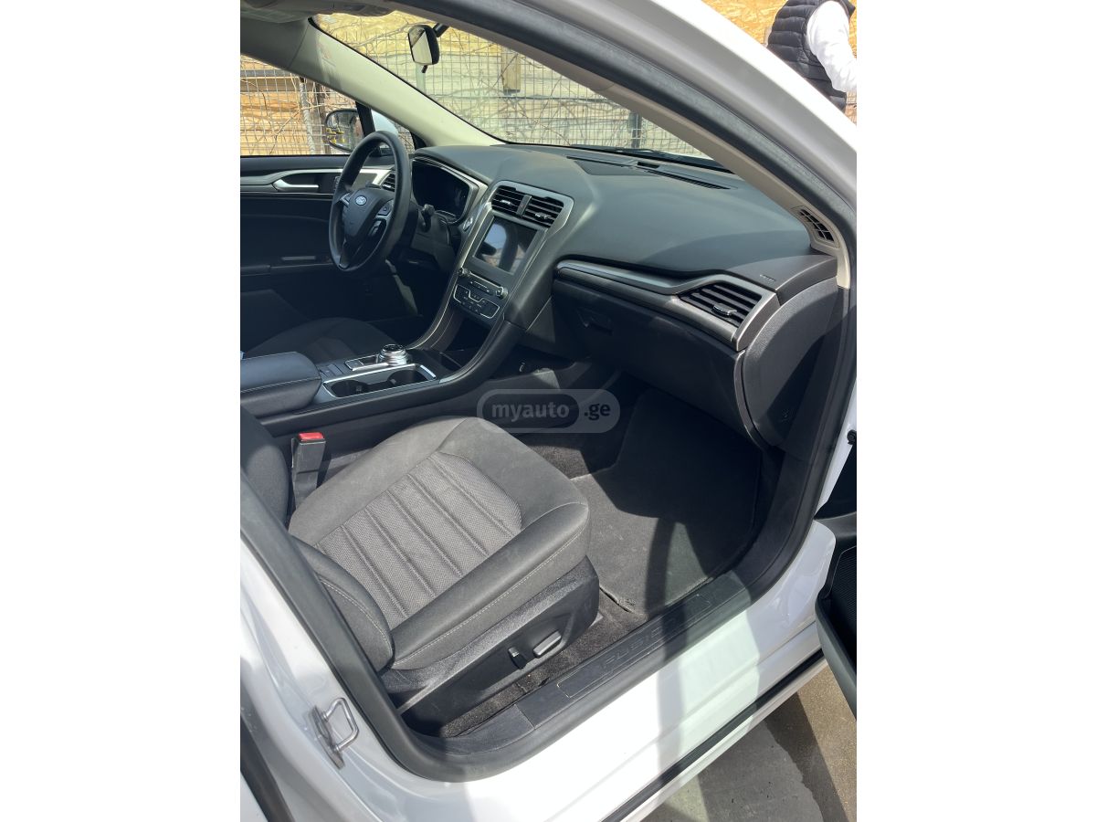 Ford Fusion - фото 7