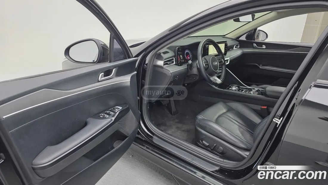 Kia Optima - фото 10