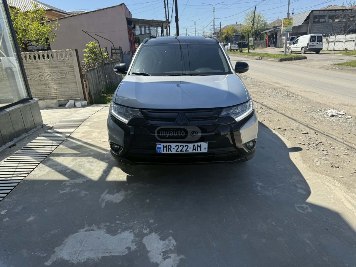 Mitsubishi Outlander - фото 1