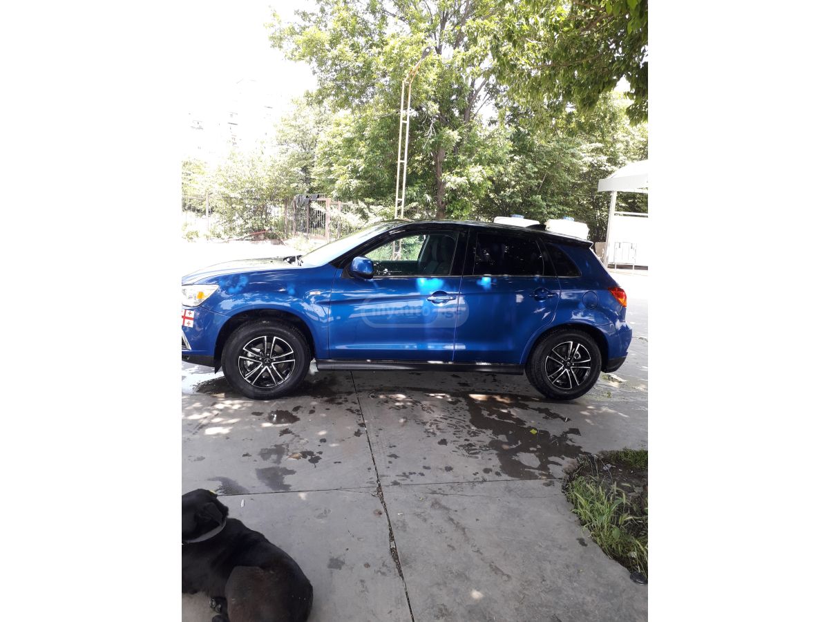 Mitsubishi Outlander Sport - фото 1