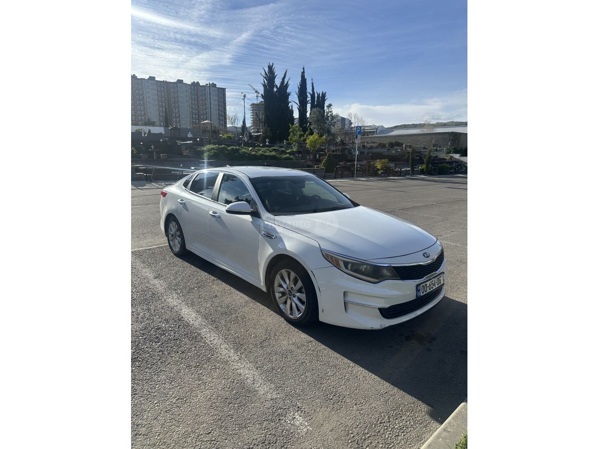 Kia Optima - фото 1