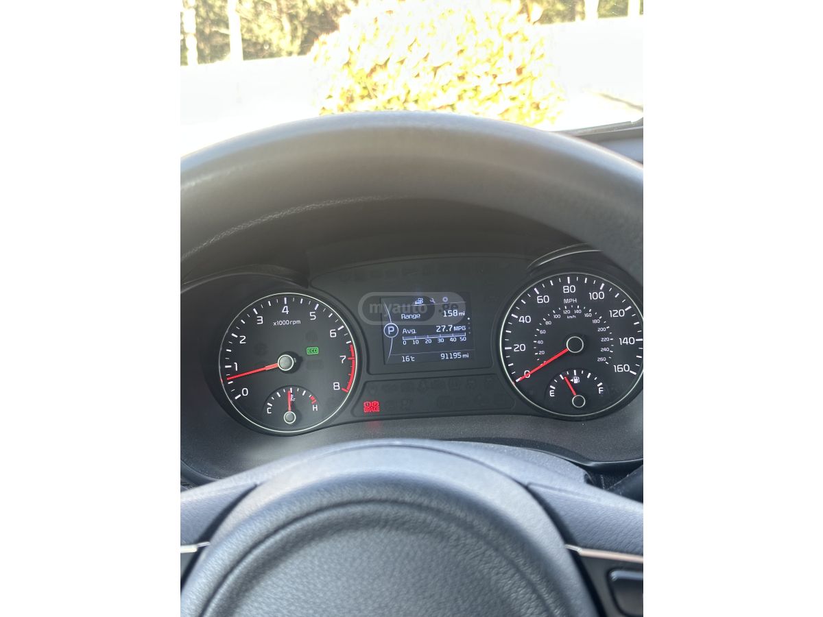 Kia Optima - фото 5