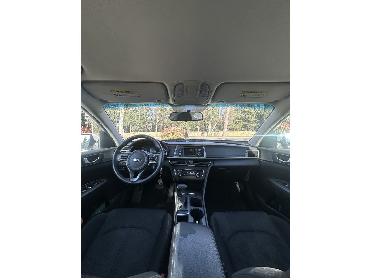 Kia Optima - фото 6