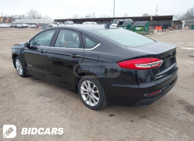 Ford Fusion - фото 7