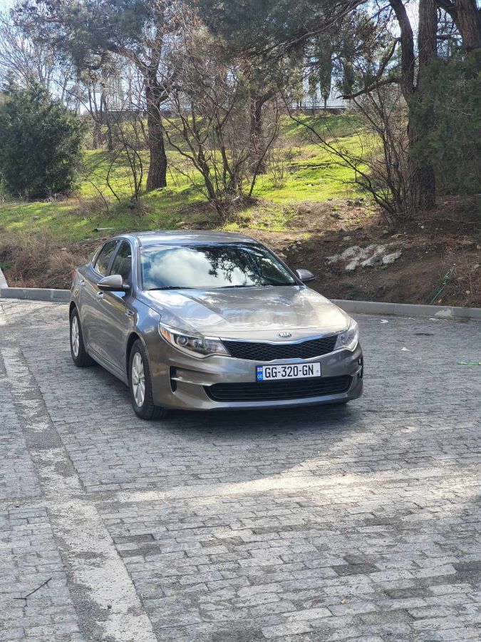 Kia Optima - фото 1