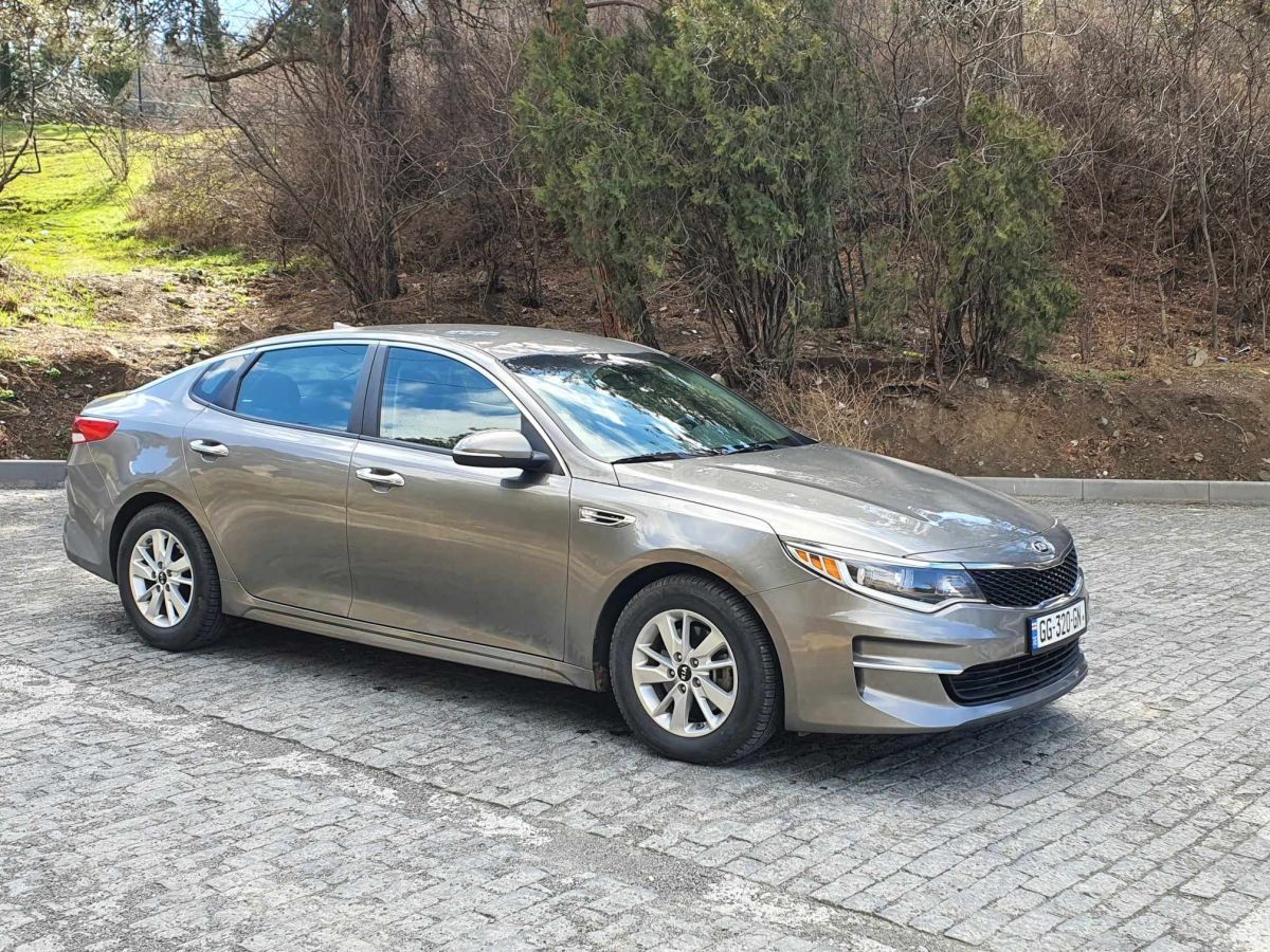 Kia Optima - фото 12