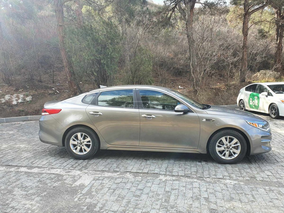 Kia Optima - фото 13