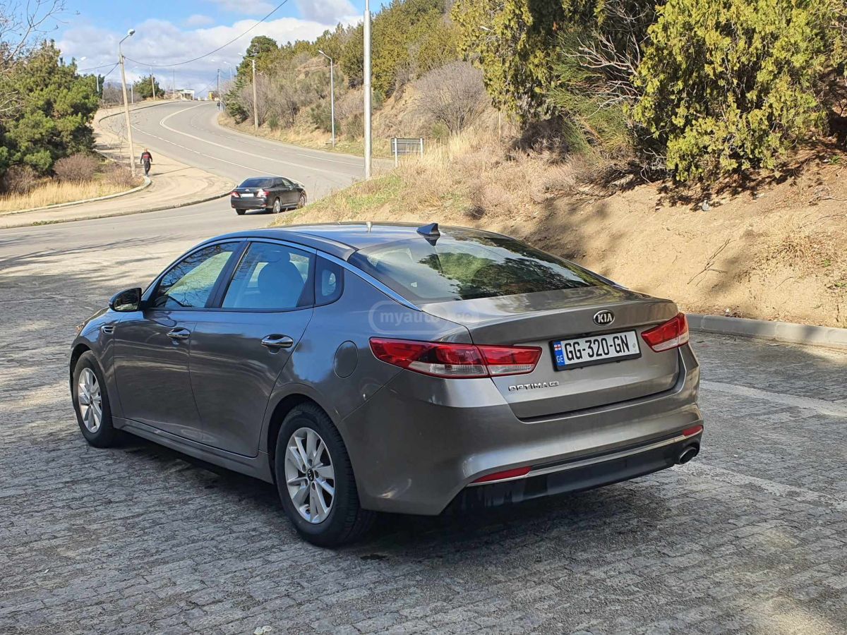 Kia Optima - фото 5
