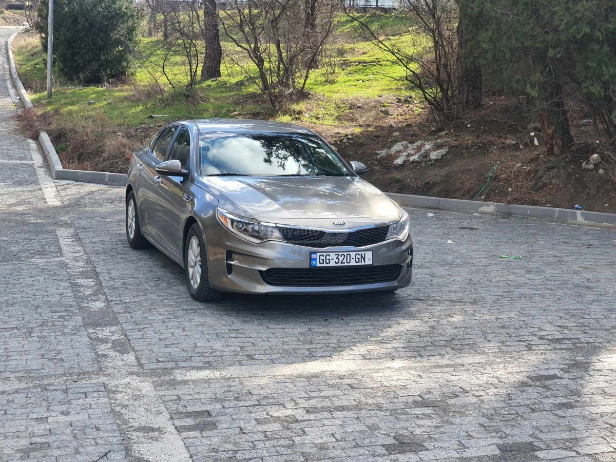 Kia Optima - фото 7