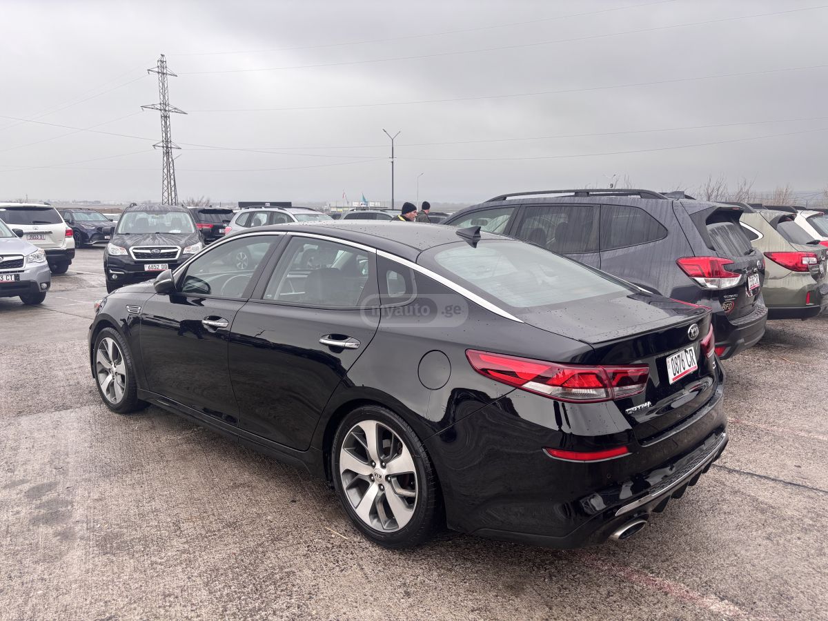 Kia Optima - фото 1