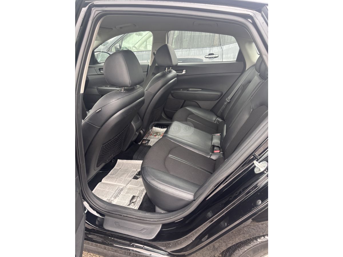 Kia Optima - фото 11