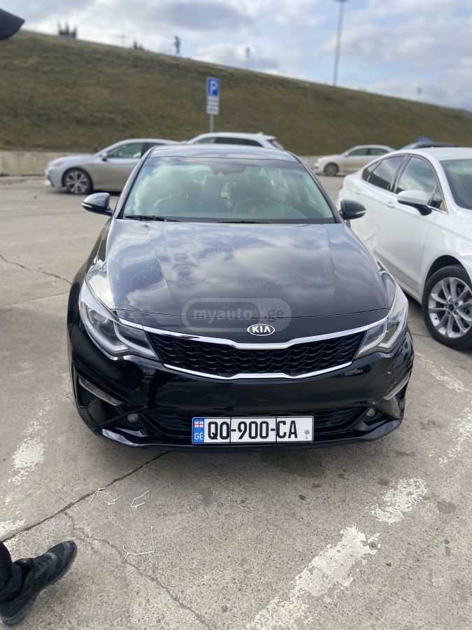 Kia Optima - фото 13