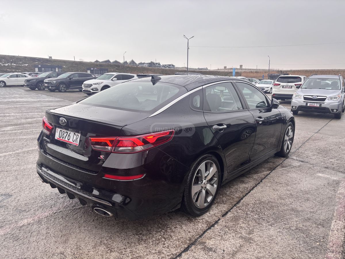 Kia Optima - фото 3