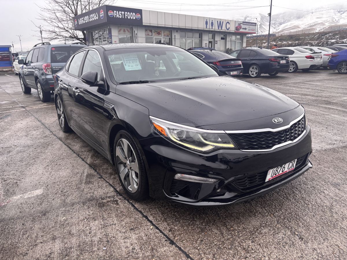 Kia Optima - фото 4