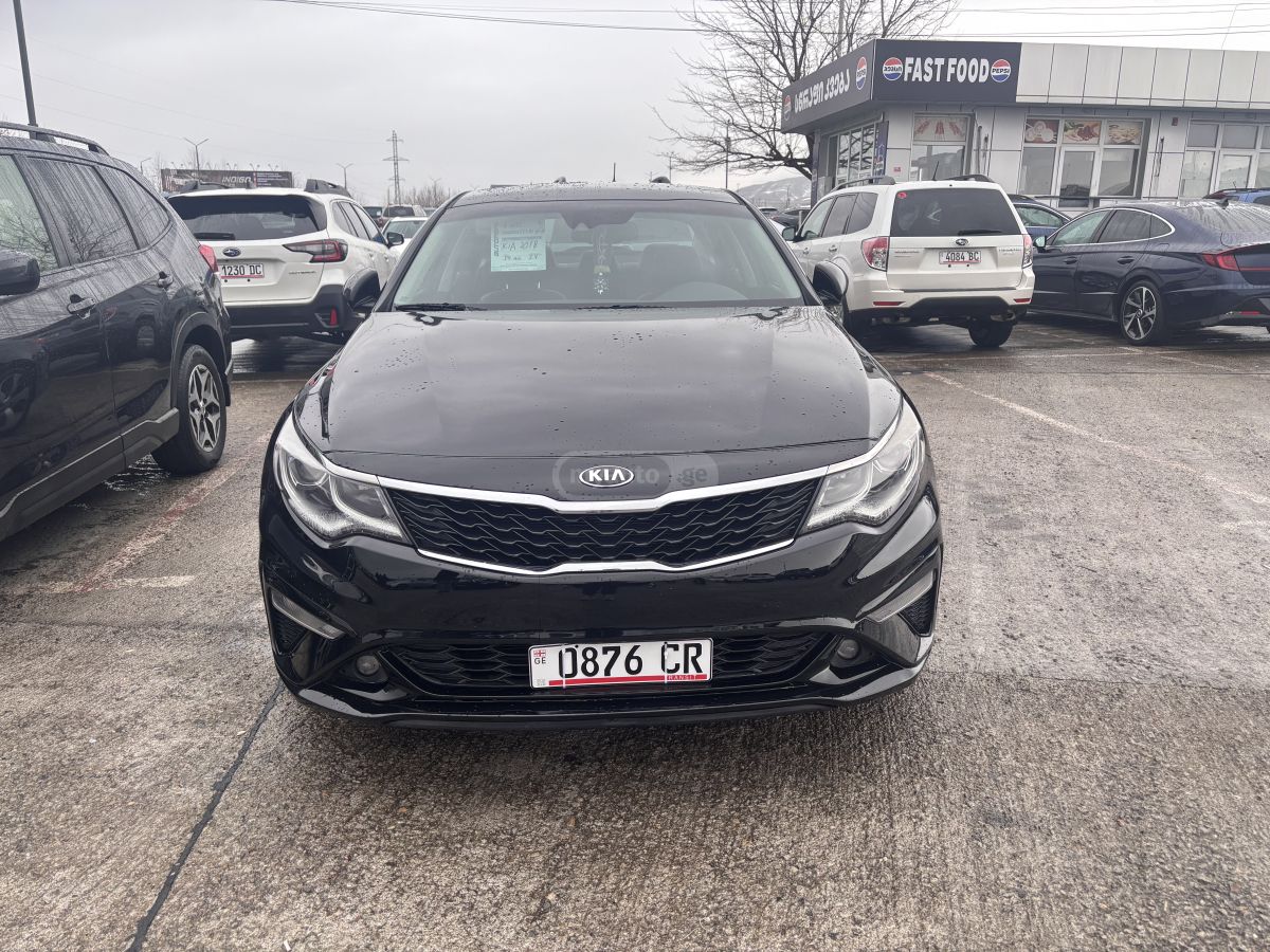 Kia Optima - фото 5