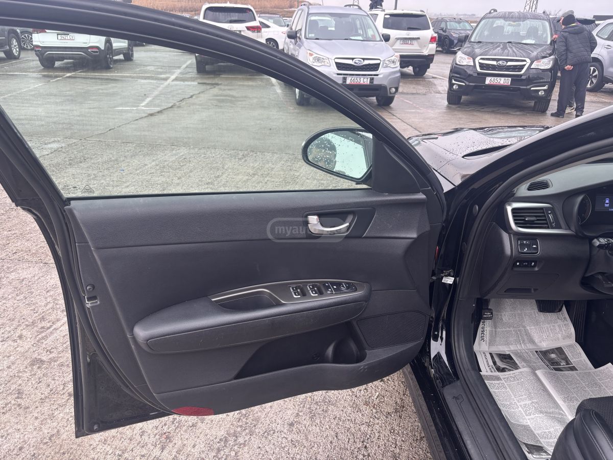 Kia Optima - фото 7