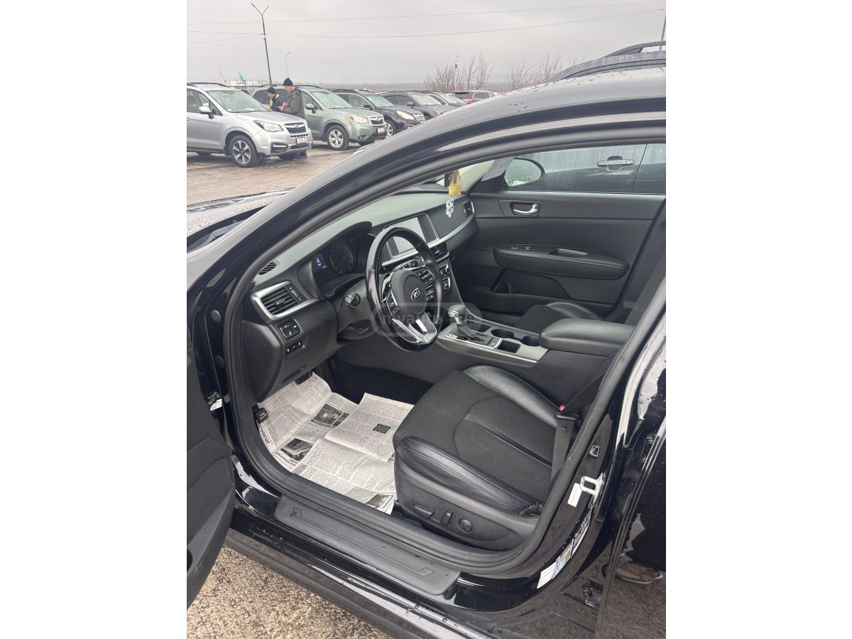 Kia Optima - фото 8