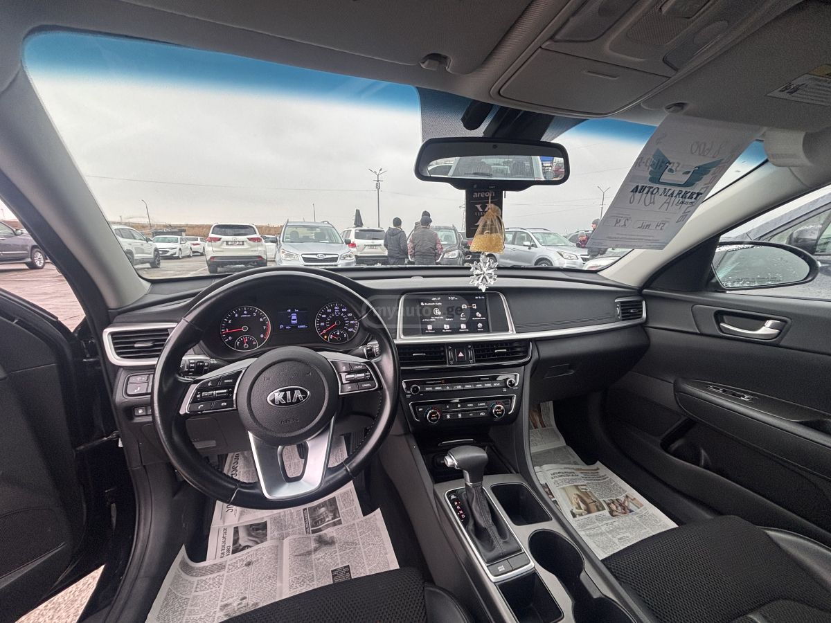 Kia Optima - фото 9