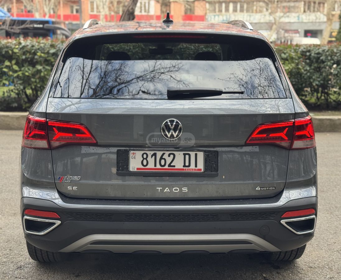 Volkswagen Taos - фото 11