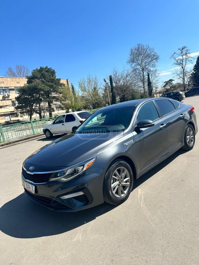 Kia Optima - фото 1