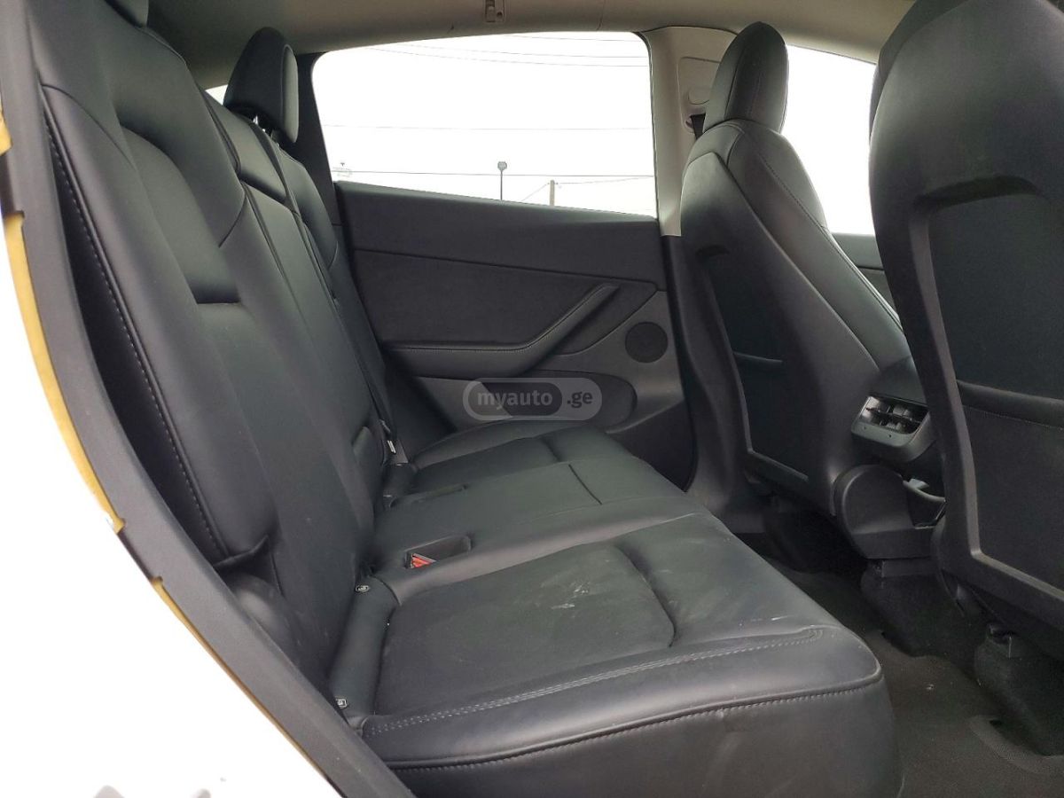 Tesla Model Y - фото 10