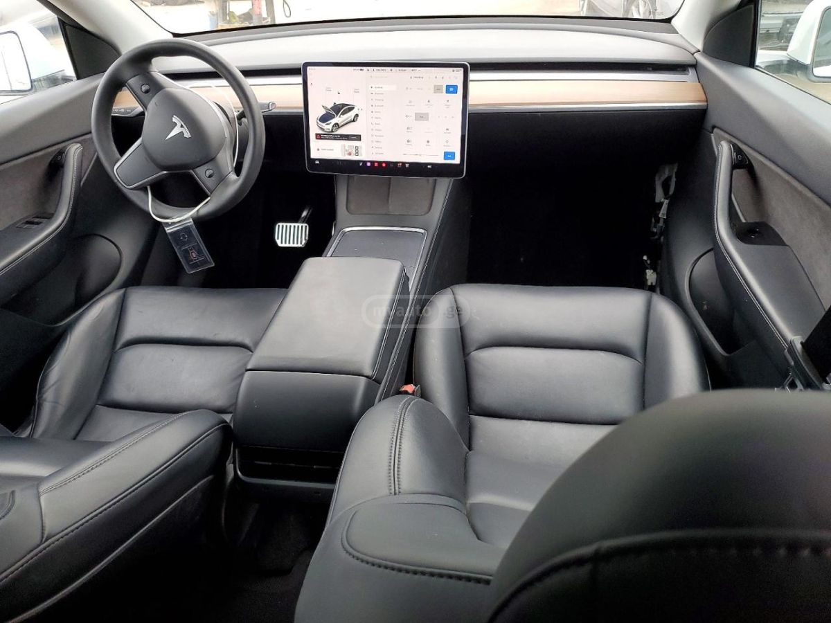 Tesla Model Y - фото 8