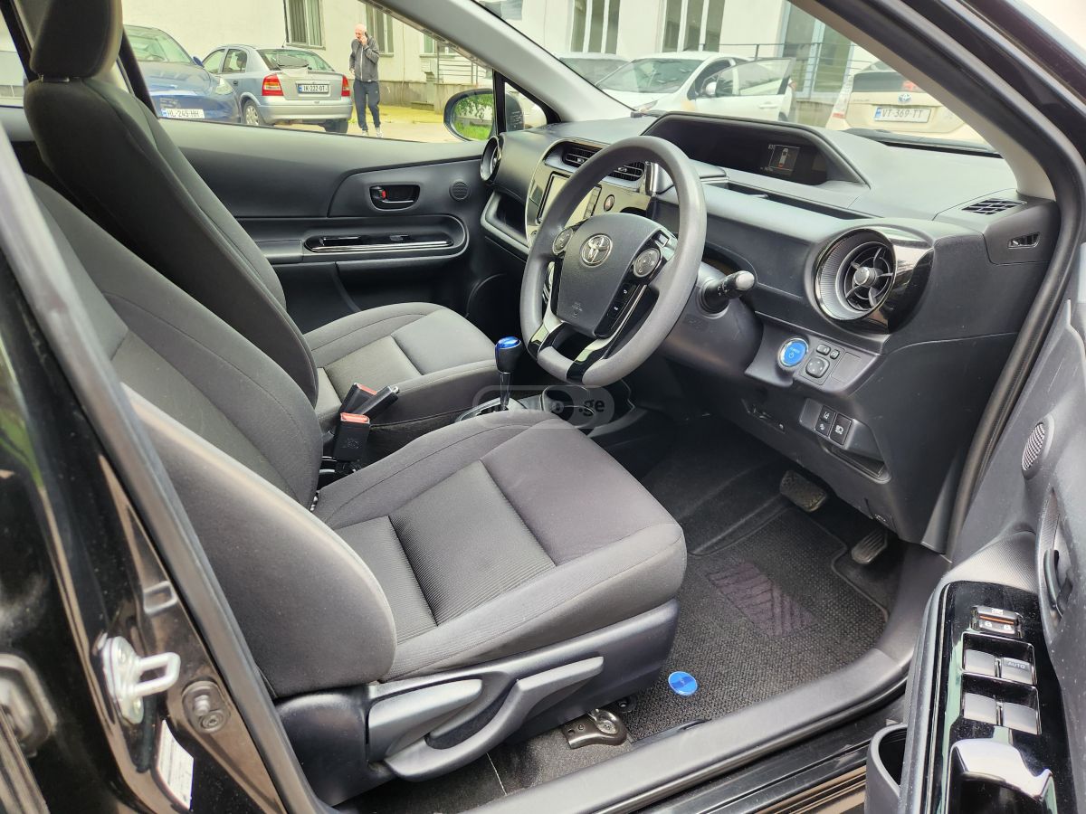 Toyota Aqua - фото 11