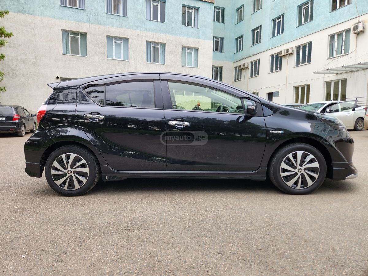 Toyota Aqua - фото 9