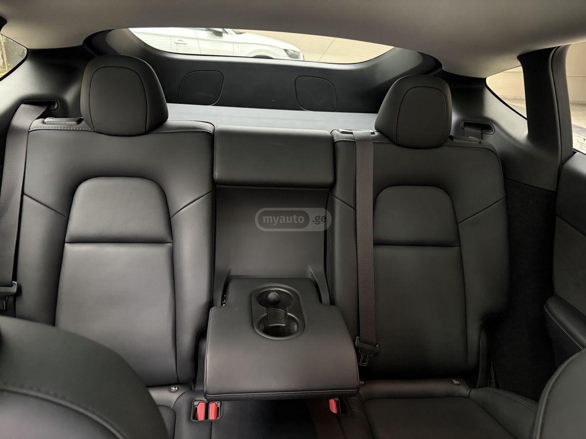 Tesla Model Y - фото 10
