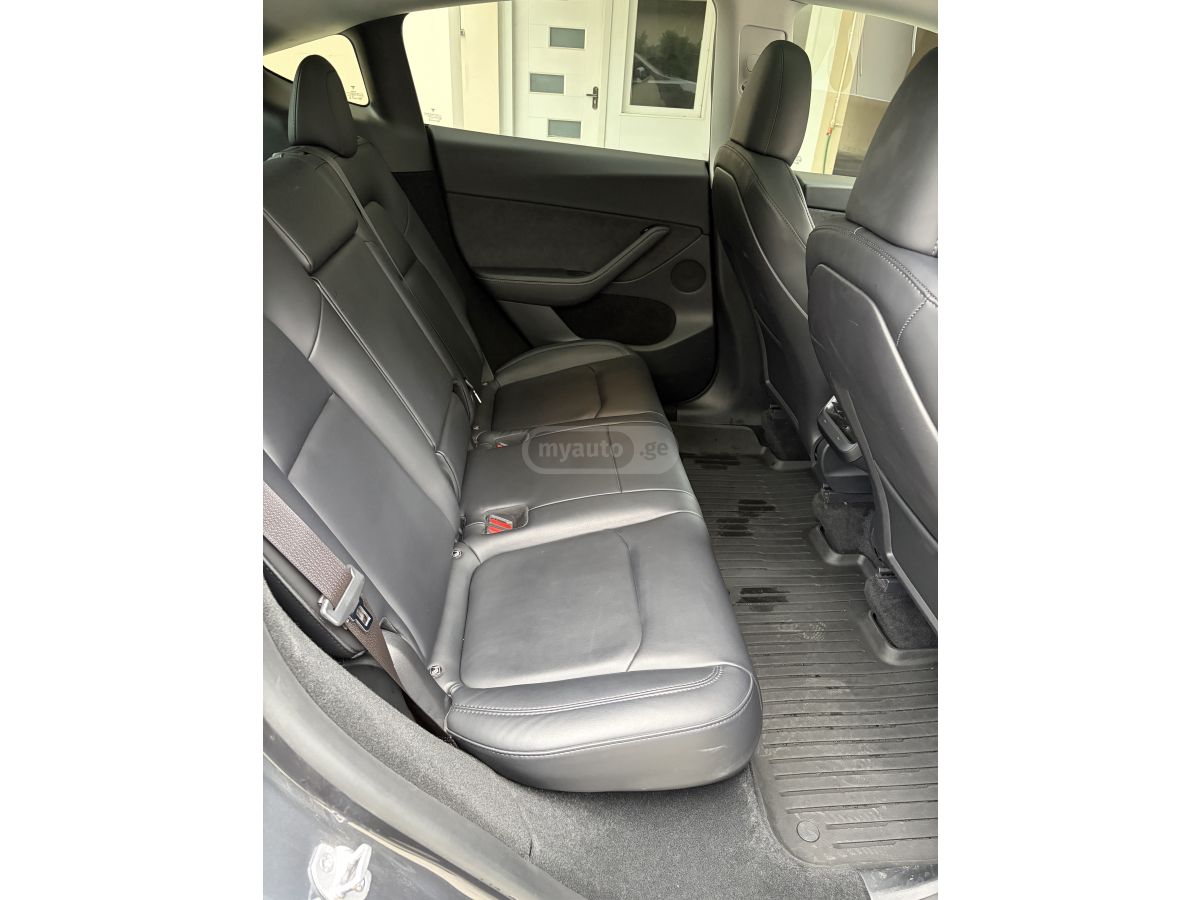 Tesla Model Y - фото 11