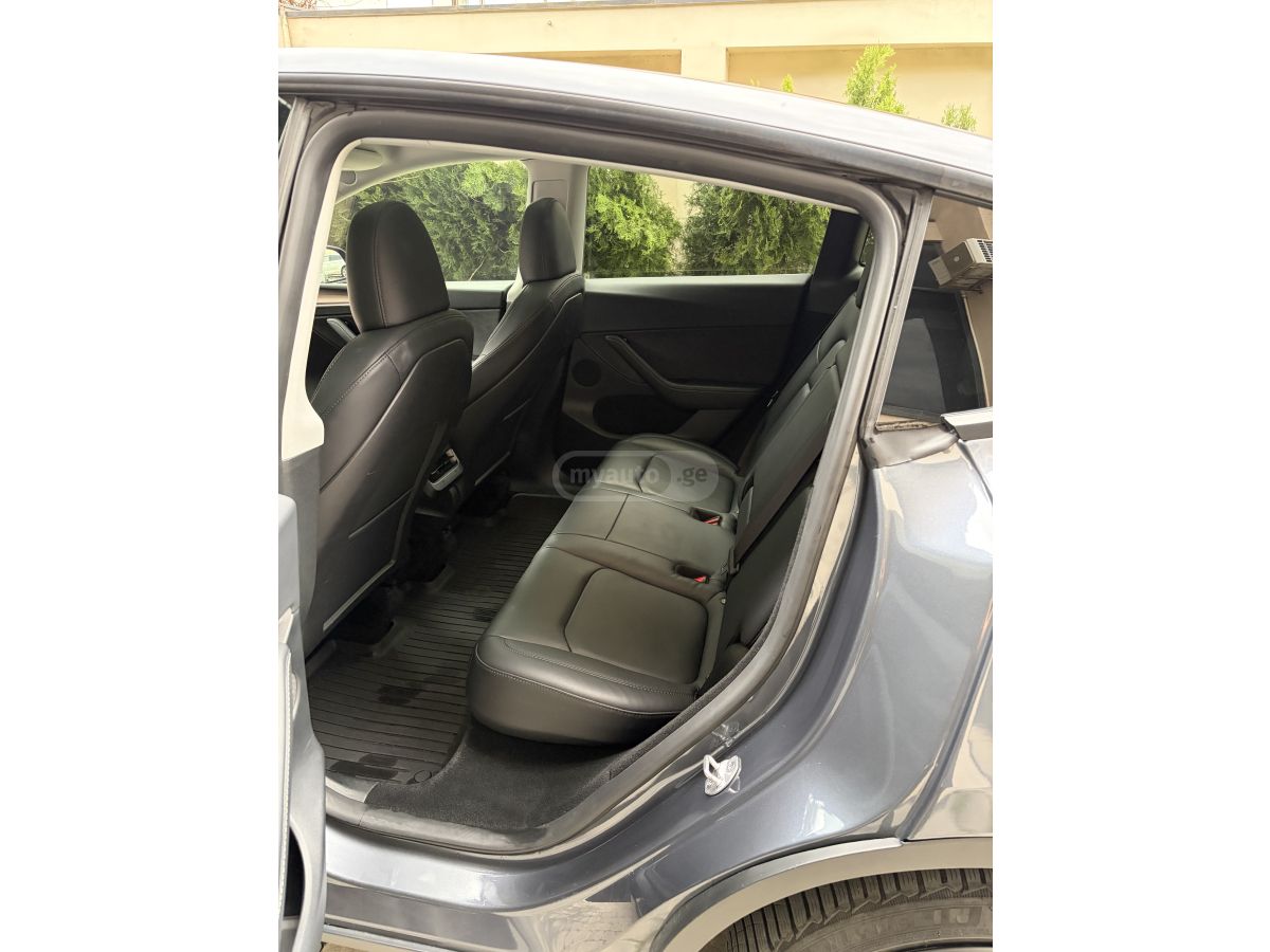 Tesla Model Y - фото 12